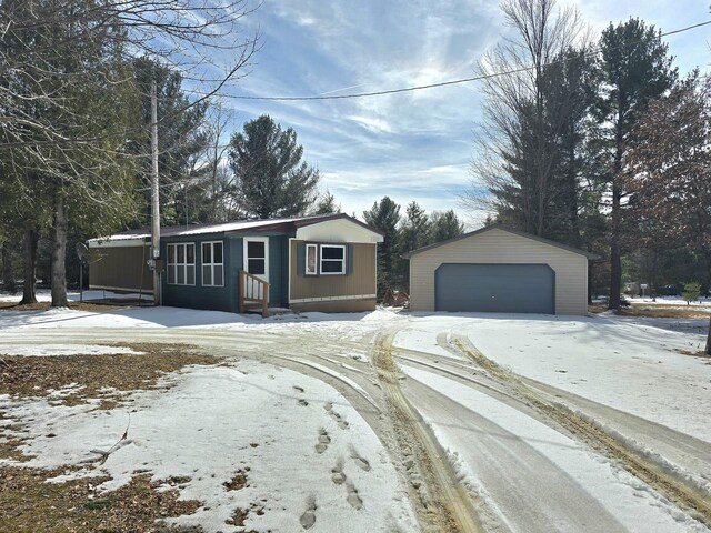 W5029 N Pathfinder Cir, Shawano, WI 54166 - view of front of home featuring an outdoor structure and a garage
