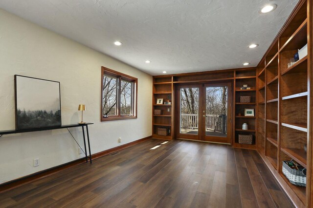 2842 Moelter Dr, Lake Geneva, WI 53147 - interior space featuring baseboards, plenty of natural light, a textured ceiling, and dark wood-style floors