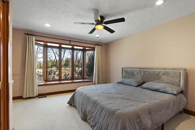 2842 Moelter Dr, Lake Geneva, WI 53147 - bedroom with visible vents, baseboards, carpet floors, recessed lighting, and a textured ceiling