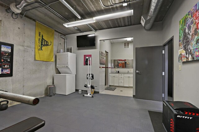 2842 Moelter Dr, Lake Geneva, WI 53147 - workout area with visible vents and stacked washer and clothes dryer