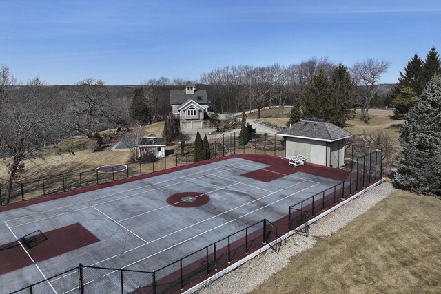 2842 Moelter Dr, Lake Geneva, WI 53147 - view of basketball court with a yard and fence