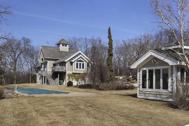 2842 Moelter Dr, Lake Geneva, WI 53147 - exterior space featuring stairway, a yard, and a wooden deck
