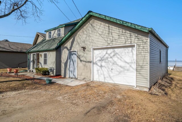 exterior space with dirt driveway