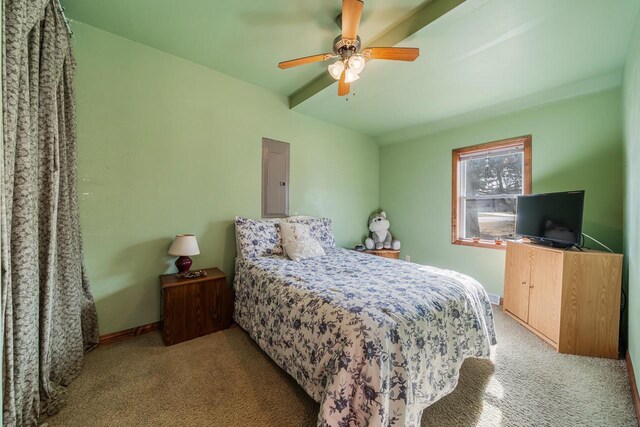 bedroom with light carpet, baseboards, electric panel, and a ceiling fan