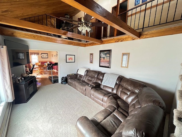 living room with beamed ceiling, carpet flooring, a ceiling fan, and high vaulted ceiling