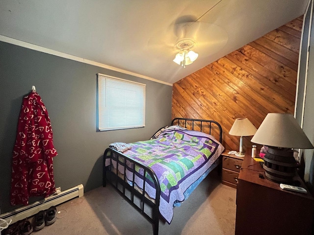 bedroom featuring wooden walls, carpet, lofted ceiling, baseboard heating, and ceiling fan