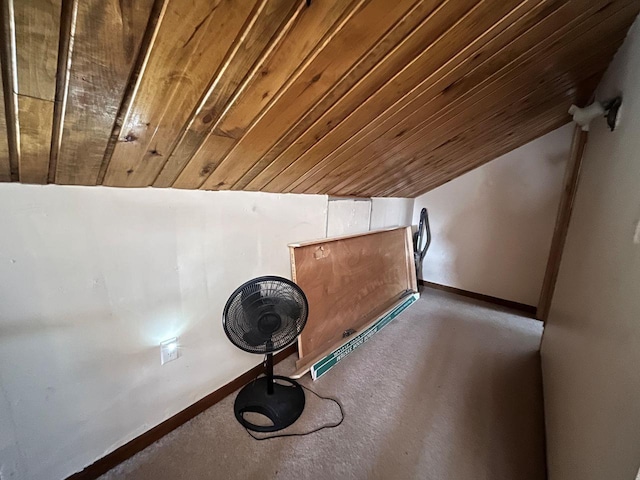 interior details featuring wood ceiling and baseboards