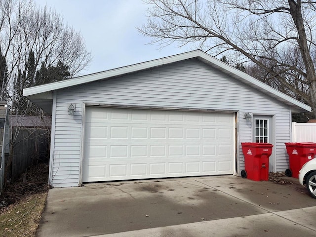 detached garage with fence