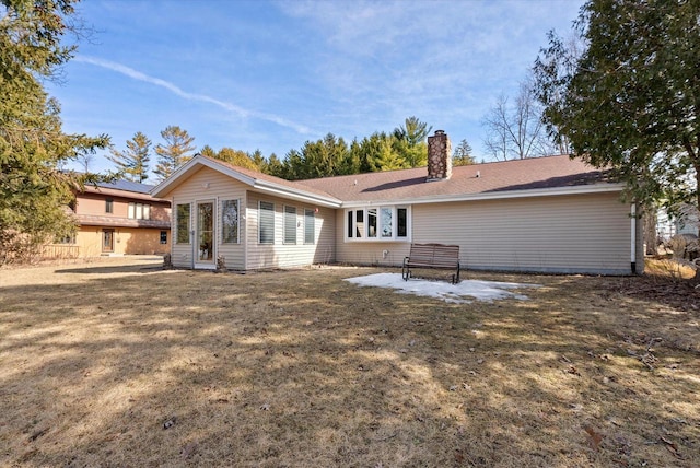 37 E Shore Dr, Random Lake, WI 53075 - back of house with a yard and a chimney