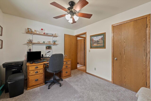 37 E Shore Dr, Random Lake, WI 53075 - office space featuring light colored carpet, baseboards, and a ceiling fan