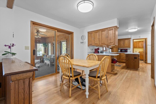 37 E Shore Dr, Random Lake, WI 53075 - dining space with light wood finished floors