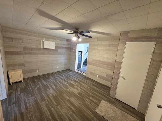 unfurnished bedroom with ceiling fan and wood finished floors