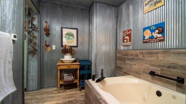 204629 Lake Dr, Rosholt, WI 54473 - full bathroom with wood finished floors and a whirlpool tub