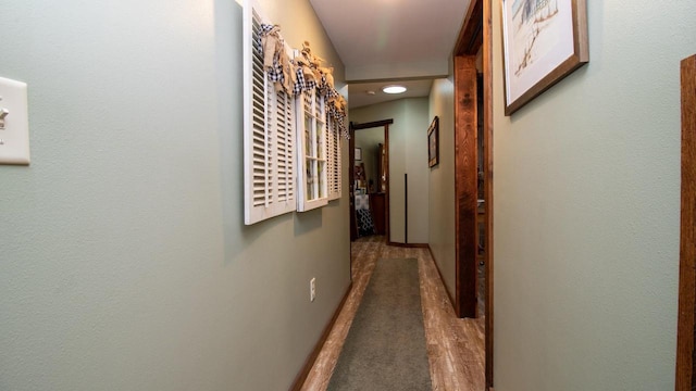 204629 Lake Dr, Rosholt, WI 54473 - hallway with wood finished floors and baseboards