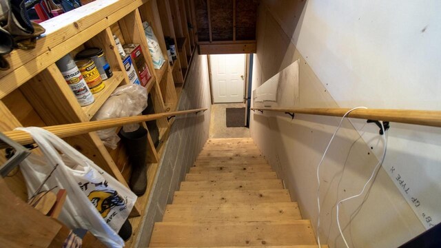 204629 Lake Dr, Rosholt, WI 54473 - stairway featuring wood finished floors