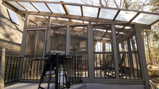 204629 Lake Dr, Rosholt, WI 54473 - deck featuring a sunroom