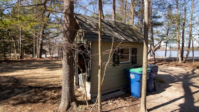 204629 Lake Dr, Rosholt, WI 54473 - view of outdoor structure featuring a water view and an outbuilding