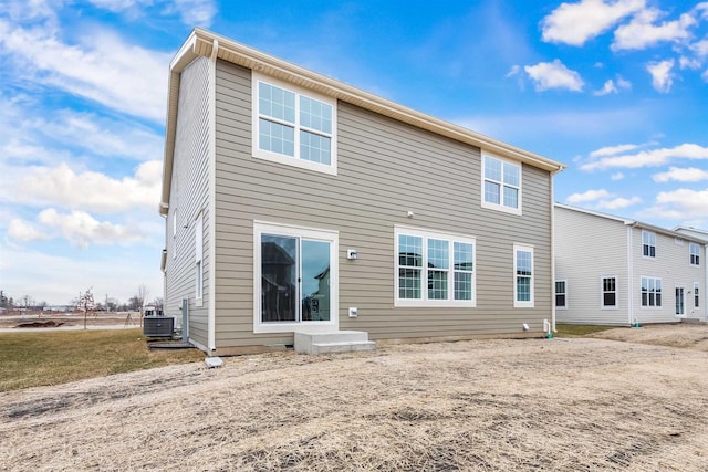 1251 Denmark Cir, Oregon, WI 53575 - rear view of house with cooling unit