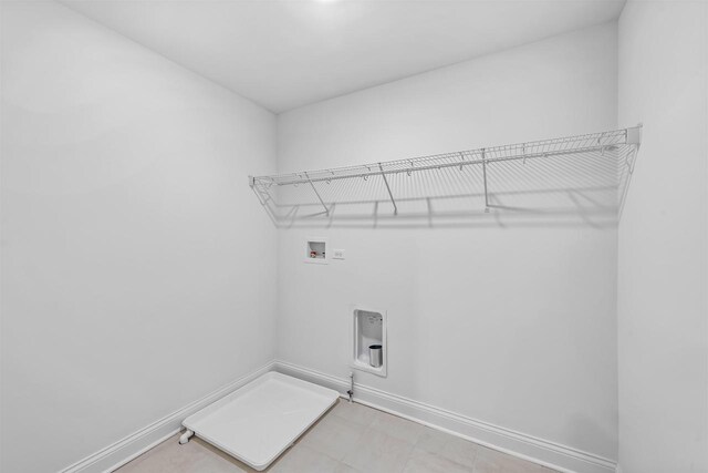 1251 Denmark Cir, Oregon, WI 53575 - washroom featuring laundry area, hookup for a washing machine, hookup for a gas dryer, and baseboards