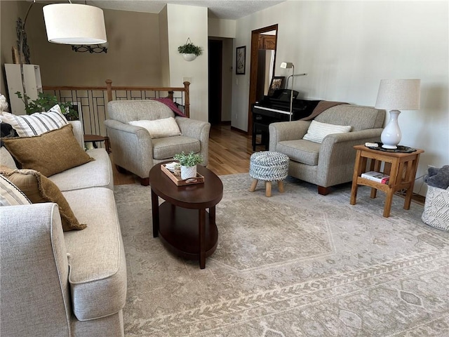 living area featuring wood finished floors