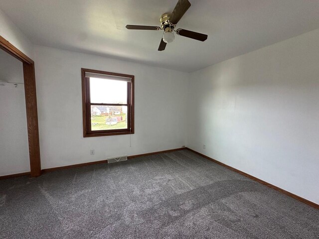 20530 84th Pl, Bristol, WI 53104 - unfurnished bedroom with visible vents, baseboards, carpet, and a ceiling fan
