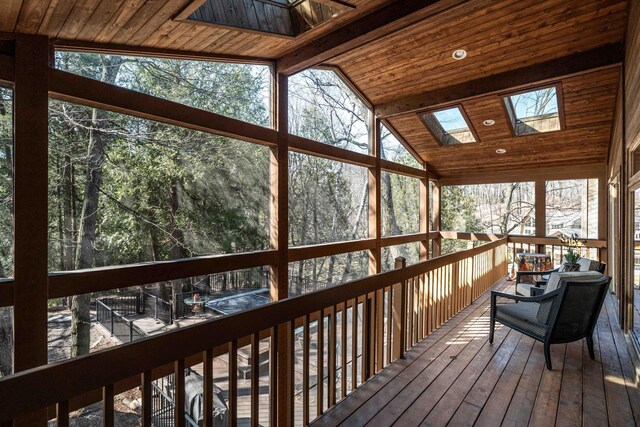 sunroom with a skylight