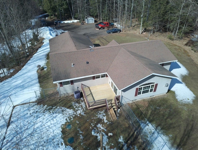 aerial view featuring a wooded view