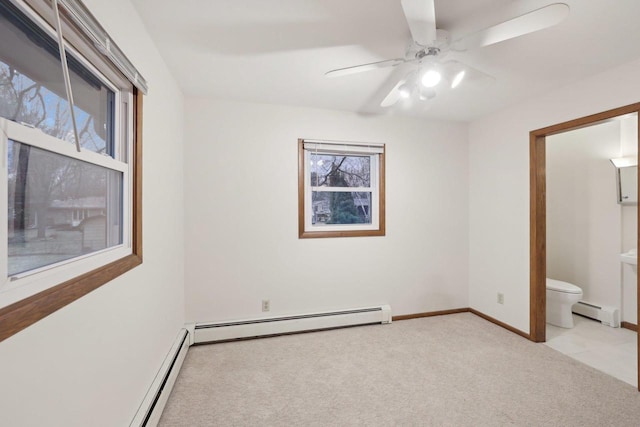5607 Alben Ave, Mcfarland, WI 53558 - unfurnished bedroom featuring carpet flooring, ensuite bathroom, a baseboard heating unit, and baseboards