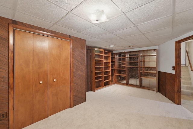 5607 Alben Ave, Mcfarland, WI 53558 - interior space with a drop ceiling, carpet, wood walls, and wainscoting