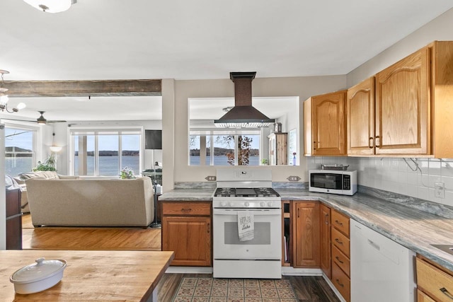 E13609 Idlewild Rd, Merrimac, WI 53561 - kitchen with light countertops, tasteful backsplash, white appliances, island range hood, and ceiling fan