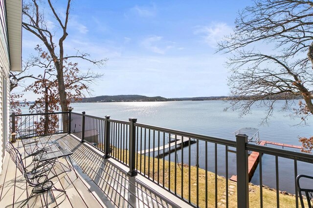 E13609 Idlewild Rd, Merrimac, WI 53561 - wooden deck featuring a water view