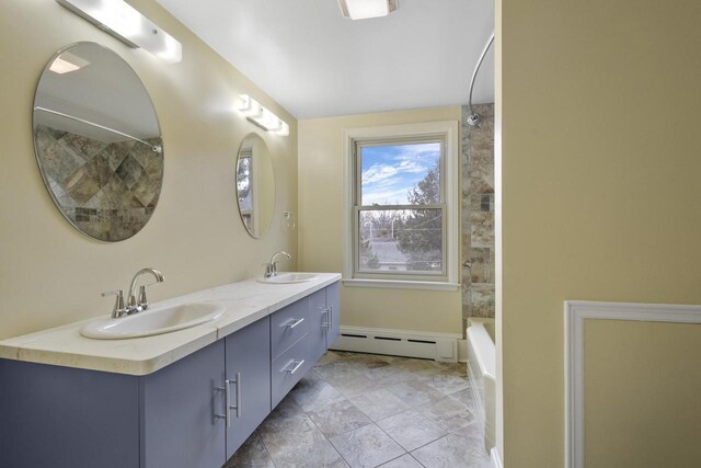 1203 Hewitt St, Neenah, WI 54956 - full bathroom with double vanity, a baseboard heating unit, and a sink