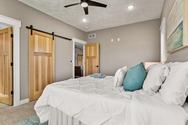 3814 W Fieldwood Dr, Janesville, WI 53545 - bedroom with visible vents, ceiling fan, carpet, a barn door, and recessed lighting