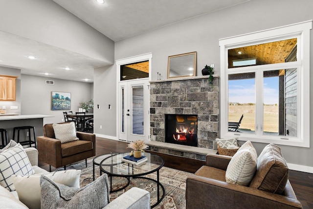3814 W Fieldwood Dr, Janesville, WI 53545 - living area featuring recessed lighting, baseboards, dark wood-style floors, and a fireplace