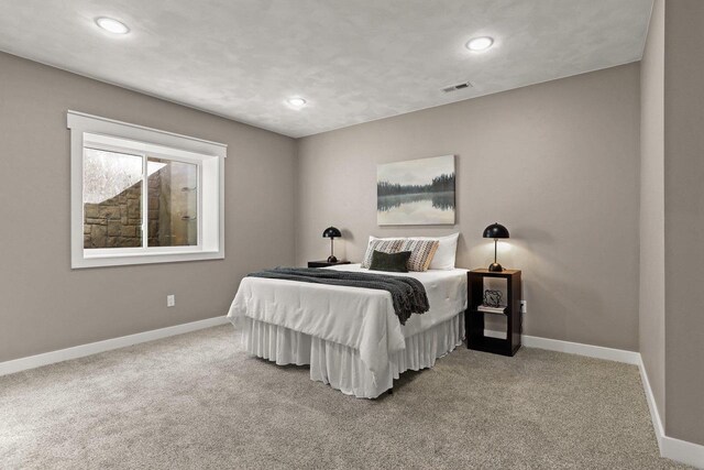 3814 W Fieldwood Dr, Janesville, WI 53545 - carpeted bedroom with recessed lighting, visible vents, and baseboards