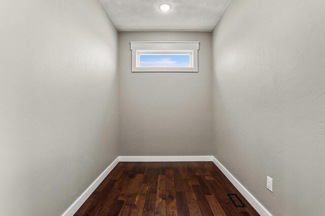 3814 W Fieldwood Dr, Janesville, WI 53545 - spare room with visible vents, baseboards, and hardwood / wood-style flooring