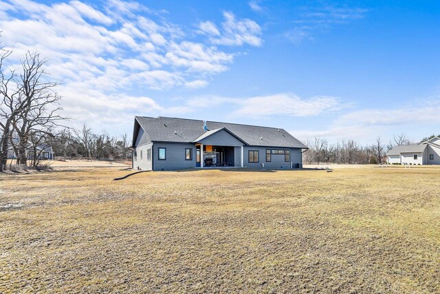 3814 W Fieldwood Dr, Janesville, WI 53545 - view of front of house featuring a shingled roof