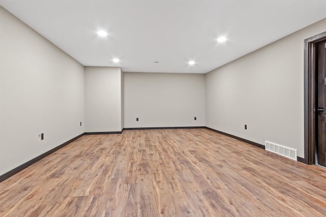 1644 Kingswood Trl, Nekoosa, WI 54457 - unfurnished room featuring light wood-type flooring, recessed lighting, and baseboards