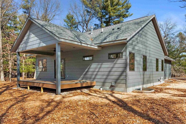 1644 Kingswood Trl, Nekoosa, WI 54457 - view of property exterior featuring a ceiling fan and roof with shingles