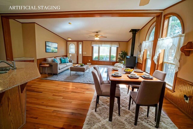 N7957 15th Ave, New Lisbon, WI 53950 - dining area with ceiling fan, ornamental molding, light wood-style floors, and wainscoting
