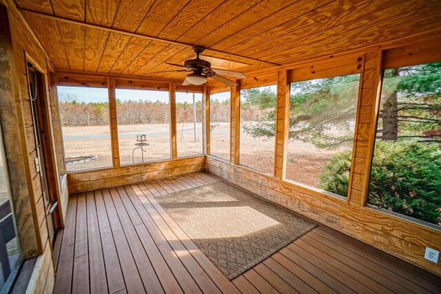 N7957 15th Ave, New Lisbon, WI 53950 - unfurnished sunroom with a wealth of natural light, a sauna, wooden ceiling, and ceiling fan