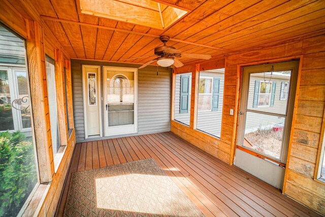 N7957 15th Ave, New Lisbon, WI 53950 - unfurnished sunroom featuring wood ceiling and a ceiling fan