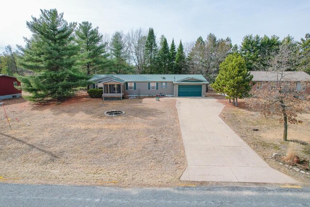 N7957 15th Ave, New Lisbon, WI 53950 - single story home with driveway and an attached garage