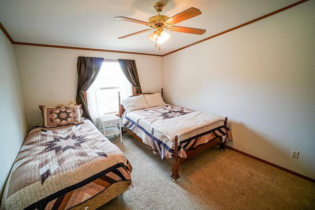 N7957 15th Ave, New Lisbon, WI 53950 - carpeted bedroom with baseboards, ceiling fan, and crown molding