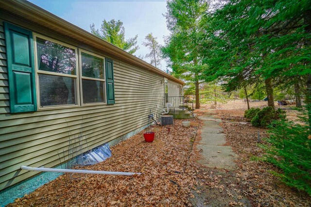 N7957 15th Ave, New Lisbon, WI 53950 - view of home's exterior with central AC