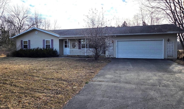 N2798 Little Green Rd, Markesan, WI 53946 - single story home with driveway, an attached garage, and a porch
