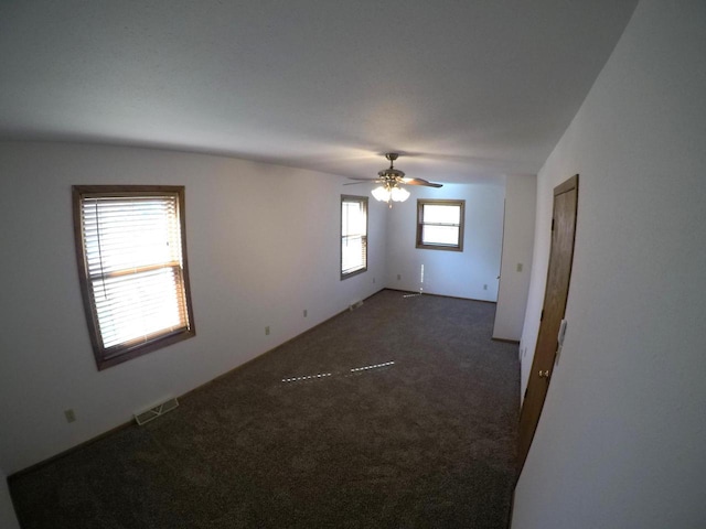 N2798 Little Green Rd, Markesan, WI 53946 - carpeted empty room featuring visible vents and a ceiling fan