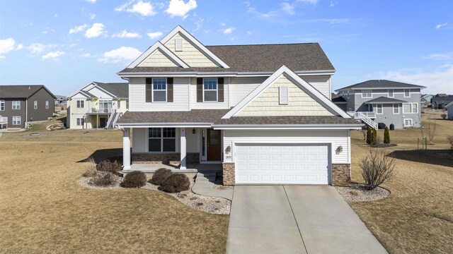 craftsman house featuring an attached garage, roof with shingles, covered porch, stone siding, and driveway