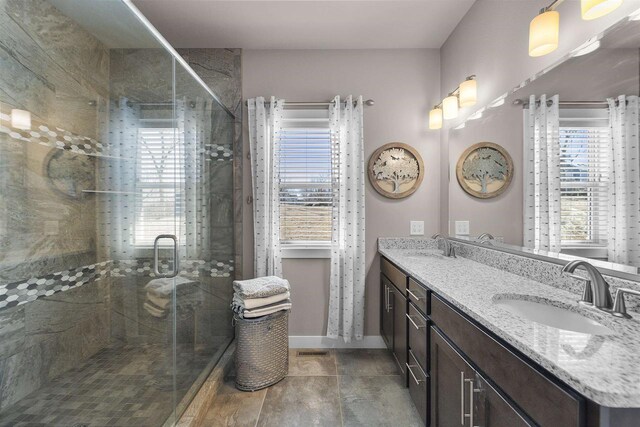 301 Church St, Barneveld, WI 53507 - full bath with a healthy amount of sunlight, a stall shower, and a sink