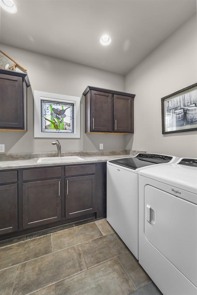 301 Church St, Barneveld, WI 53507 - laundry area featuring separate washer and dryer, recessed lighting, cabinet space, and a sink